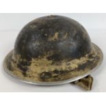 A 1941 WWII British Mk II steel helmet worn by a member of the Royal Engineers, service number