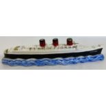 A vintage ceramic Cherry Brandy ceramic decanter in the shape of The Queen Mary Liner. Produce