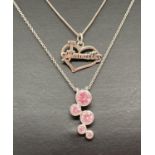2 silver pendant necklaces. A modern design pendant set with 5 round cut pink stones on an 18 inch