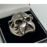 A heavy silver dress ring in the shape of a British Bulldog. Full hallmarks to inside of ring.