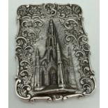 A Nathaniel Mills Victorian silver Castle Top card case featuring The Scott Memorial in relief.