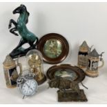 A box of assorted misc items to include vintage ceramic steins, clocks and vintage copper framed