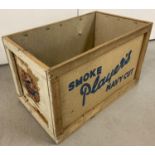 A vintage Player's Navy Cut Cigarette delivery box with remnants of the original delivery label to