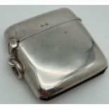 An early 20th century silver curve backed vesta case fully hallmarked to lid and inner rim.