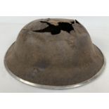 A Relic condition British MKII steel helmet recovered from the battlefield below the monastery at