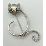 A modern design silver cat brooch by Beau. Reverse Marked "Beau Sterling". Total length 4.5cm.
