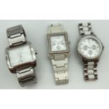 3 wristwatches by Next. All with stainless steel bracelet straps. A square face with silver tone