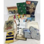 A box of assorted vintage ephemera. To include: vintage maps and tourist brochures, magazines,
