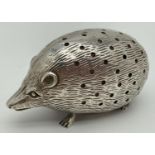 A large Edwardian silver novelty pin cushion in the form of a hedgehog. By Levi & Salaman and