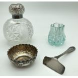 An early 20th century silver topped perfume bottle (stopper missing) together with 3 other vintage