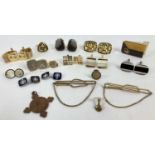 A collection of men's vintage cufflinks, tiepins, belt buckle and medal. To include gold tone and