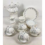 A quantity of Royal Albert tea ware in "Memory Lane" pattern. Comprising: tea pot, 8 cups & saucers,