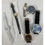 A tub of 6 assorted men's & ladies wristwatches for spares or repair. One in as new condition.