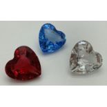 3 Swarovski Crystal Society renewal gifts. Clear crystal heart 1996, blue crystal heart 1997 and red