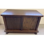 A heavy oak veneer panelled storage chest/box with front shaped feet and interior lid support