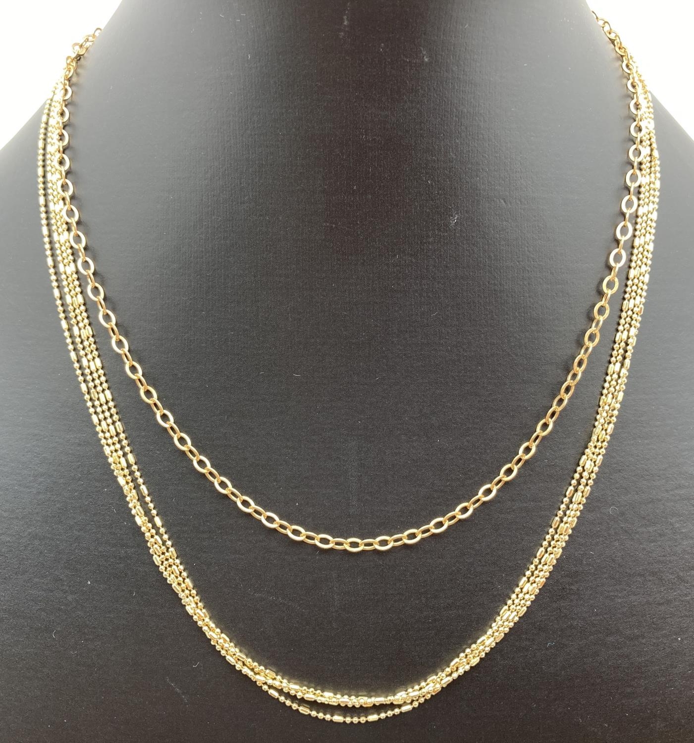 2 silver gilt chain necklaces by Veronese. A belcher chain and a multi strand decorative chain, both