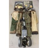 4 vintage canvas pencil golf bags together with a quantity of assorted golf clubs, golf trolley &