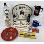 A collection of vintage breweriana. To include serving trays, Wade water jug, retro cocktail stick