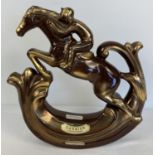 A vintage brown and gold glaze ceramic Apricot brandy decanter in the shape of a race horse and