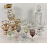 A box of assorted vintage coloured and clear glassware. To include: a square shaped cut glass