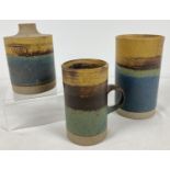 3 pieces of mid century Robin Welch stoneware studio pottery in blue/green colourway. A 5.5" tubular