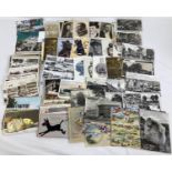 A quantity of assorted vintage and Edwardian postcards & greetings cards.