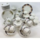 A box of assorted vintage and modern bone china tea ware. Lot includes: an 18 piece Royal Doulton
