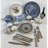 A box of vintage mostly blue and white ceramics, together with silver plate and horn handled fish