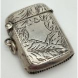 A Robert Pringle & Sons Edwardian Silver vesta case with engraved foliate detail front & back. Curve