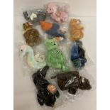 10 Beanie Baby character toys by TY. All with original tags and clear plastic packaging.