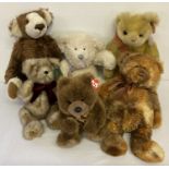 A collection of 6 modern teddy bears.