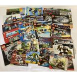 A quantity of assorted Lego instruction manual, leaflets and posters.