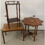 A reproduction occasional table with inlaid detail to top.