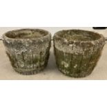 A pair of vintage concrete half barrel design garden planters with drainage holes to base.