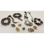 A collection of costume jewellery to include necklaces, earrings and glass bead bracelets.