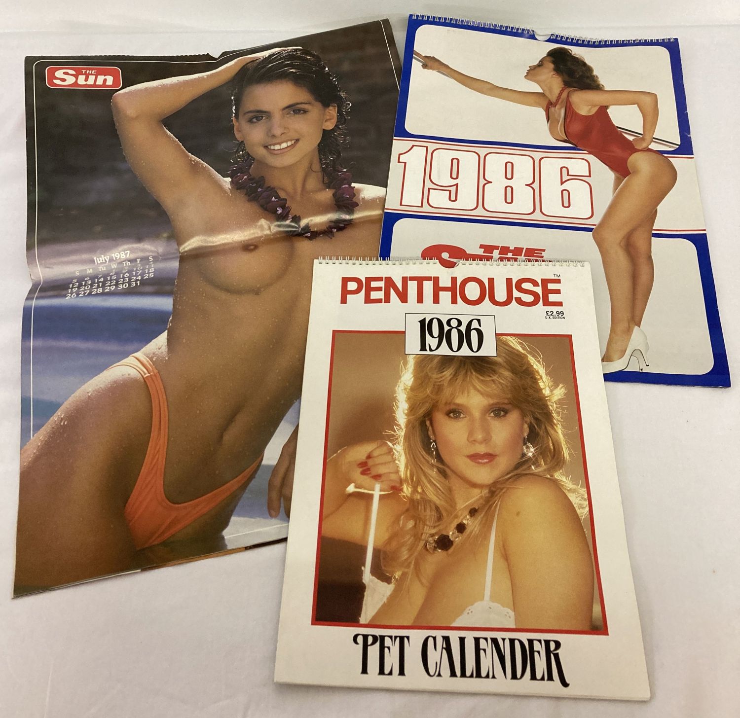 3 1980's colour spiral bound adult erotic calendars from Penthouse, The Sun & The Star.