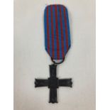 A post war Monte Cassino Medal Of Honour on blue and red ribbon. Measures 40mm across. …