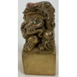 A Chinese gilt bronze seal with dragon shaped finial and set with turquoise and coral cabochons. …