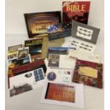 A quantity of assorted ephemera to include first day covers and commemorative stamp sets. Lot inc…