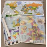 A collection of poster sized laminated wall maps of The World, Europe and The British Isles. …