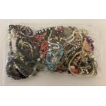 A sealed bag of assorted modern costume jewellery, to include bracelets and necklaces. Approx. 2.…
