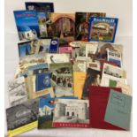 A box of assorted vintage ephemera, mostly souvenir tourist brochures, guide books, maps and prog…