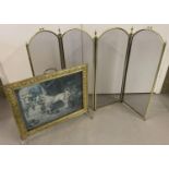 A vintage brass framed firescreen together with a more modern metal framed mesh folding fireguard…