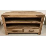 A modern solid mango wood corner media unit with 2 drawers & 2 open shelves. Approx. 61cm tall x…