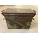 A green painted military metal ammunition box. Approx. 47 x 22 x 37cm tall. …
