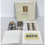 A copy of "Queen Elizabeth II A Jubilee Portrait In Stamps" together with a small collection of S…