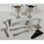 A box of mixed silver plate and metal ware items To include 2 trophy cups engraved "Glen Gorse Go…