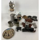 A box of assorted misc vintage items to include ceramics, cameras & metal ware. Lot includes a ca…