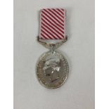 A modern copy of George VI The air Force Medal with red and white ribbon. …