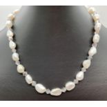 A 16" alternate freshwater pearl and grey crystal bead necklace with white metal T bar clasp. Ex